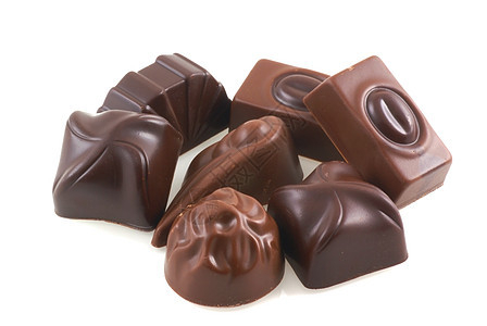 比利时巧克力棕色糖果食物宏观白色甜点背景图片