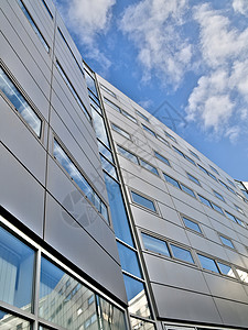 蓝色办公大楼市中心反射窗户办公室镜子公司建筑房地产城市职场图片