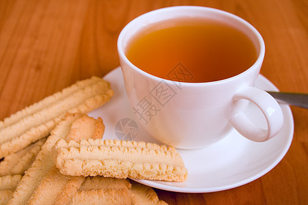 茶杯和饼干早餐补品美食奢华杯子飞碟陶瓷甜点盘子饮料图片