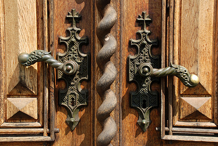 古老的门把手硬件镜头房子锁孔建筑学入口教会雕刻天气金属图片