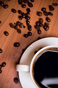 咖啡和大豆桌子豆子木头兴奋剂杯子美食营养食物盘子唤醒图片