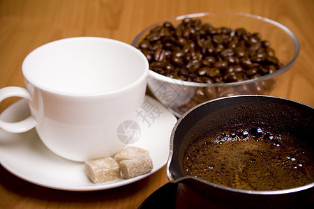玻璃碗中的咖啡 糖和豆子图片