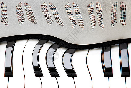 皮面背景低音音乐家按钮塑料黑色键盘钥匙耳朵创造力金属图片
