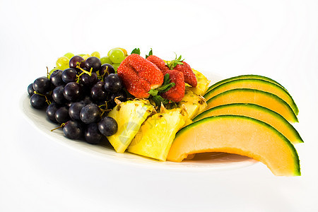 水果盘橙子拼盘黄色盘子热带玻璃食物绿色蓝色饮食图片