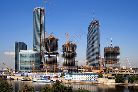兴建商业中心金融房子框架建筑学起重机蓝色城市市中心反射企业图片