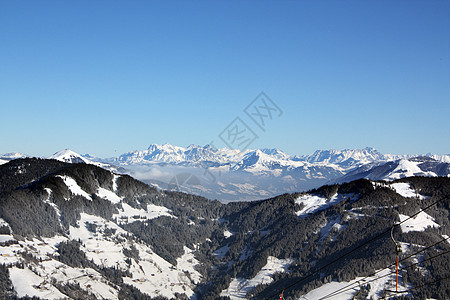 伊姆斯椅冬季草地蒂罗醇单根时间大山蓝色背景