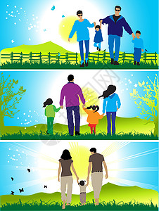 快乐的家庭在大自然上散步闲暇运动草地男人生活自由父亲太阳母亲女性图片
