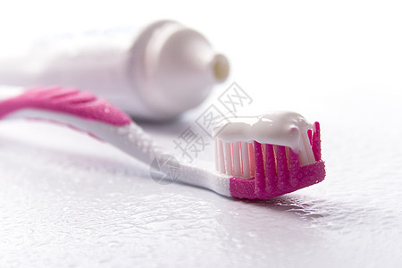 牙膏和牙刷药品管子化妆品美丽茶点产品粉色牙科牙医卫生图片