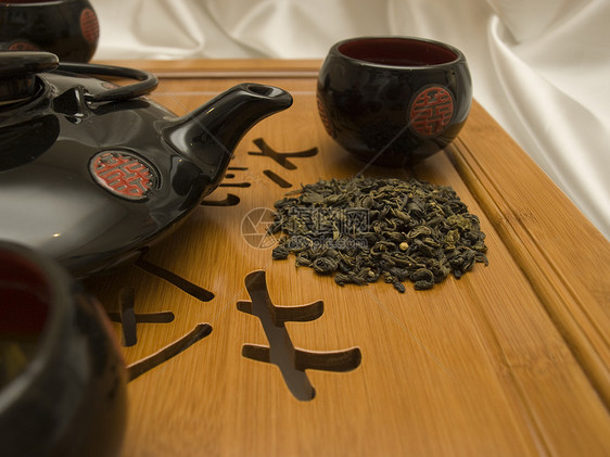 日本的茶厅仪式 东方的传统和历史 笑声液体棕色黑色平底锅房子绿色药品草本植物休息茶杯图片
