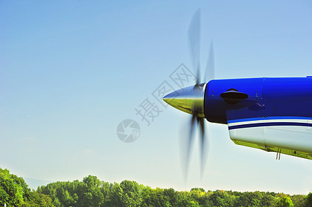 推进器螺旋桨航空刀刃水平引擎航班运输天空发动机蓝色背景图片