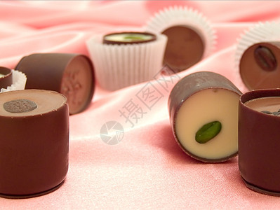 巧克力糖丝绸粉色喜悦糖果美食甜点奶油状食物可可图片