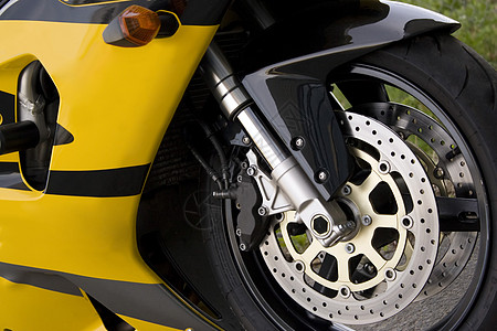 黄色摩托车自行车赛车卡尺火箭摩托车轮发动机挡泥板刹车速度图片