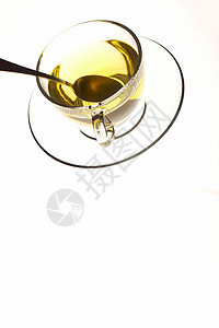 茶杯茶玻璃状口渴杯子茶碗鲁棒性玻璃飞碟绿色盘子白色图片