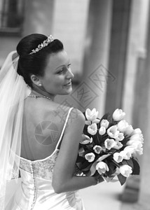 美丽的新娘微笑花束眼睛生活未婚夫女士花朵婚礼女孩选手图片