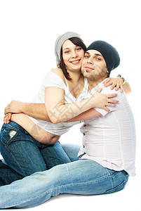 幸福的怀孕妇女及其丈夫拥抱白色乐趣母性投标女士男人压痛腹部地面图片