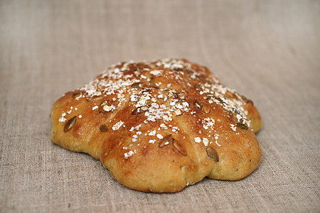 面包卷饼产品种子帆布午餐烹饪馅饼烘烤棕色美食裂纹图片