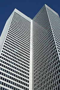 高楼办公大楼办公楼玻璃窗城市市中心中心玻璃蓝色几何房地产生长背景图片