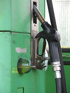 旧加油站的煤气泵背景图片