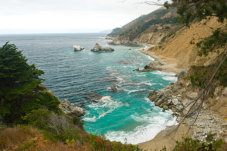 大南海岸麦威悬崖日落波浪顶峰瀑布公园岩石爬坡图片