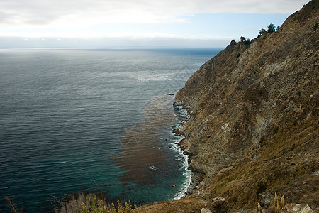 大南悬崖波浪顶峰麦威海岸日落海拔瀑布岩石海洋图片