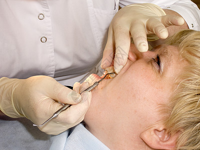 在口腔学家的内阁里口腔科牙医综合药品医生治疗接待诊所注射患者图片