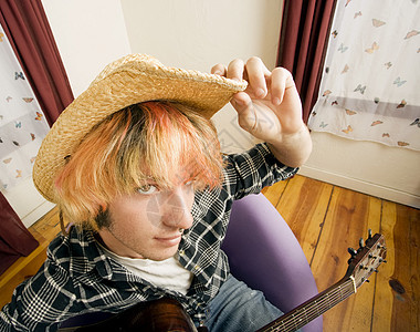 青年吉他玩家国家房间细绳乐器帽子烦恼染料岩石男生牛仔图片
