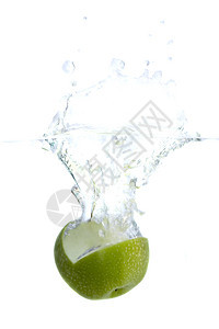 绿苹果漩涡食物横截面打扫飞溅液体生活方式静物碰撞蓝色图片