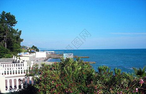 海滩沙滩旅行文化旅游天空热带房子蓝色场景气候阳光图片