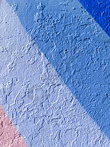 蓝色和粉色油漆混凝土墙背景图片