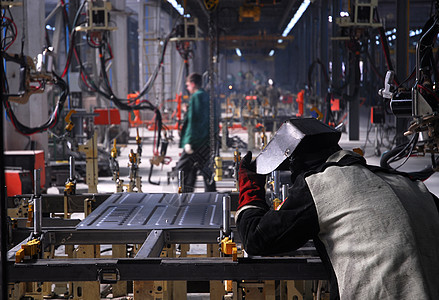 工厂焊接光束职业男人材料作品机器金属工人反射焊机图片