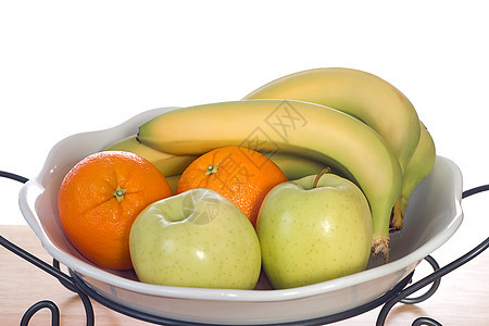 水果碗橘子果味健康橙子食物营养香蕉生产木头绿色背景图片