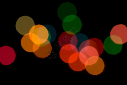 Bokeh 圆环红色圆圈橙子绿色圆形黄色黑色辉光背景图片