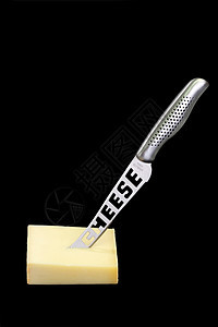 奶酪一块餐具刀具食物金属黄色营养黑色厨具图片