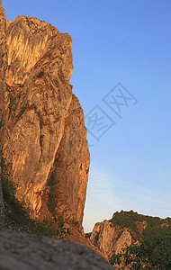 岩石旅游峡谷高度悬崖天空地质学日落植被绝壁旅行图片