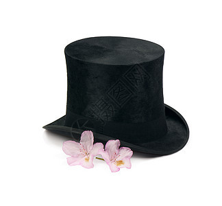 魔术帽毛毡戏服黑色静物水平魔法古董戏剧花朵白色背景图片