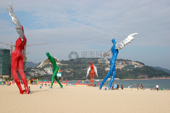 海边的天使雕塑天空翅膀飞行安全海滩图片