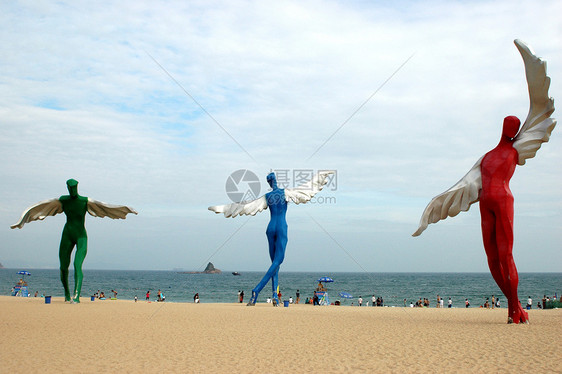 海边的天使海滩雕塑安全天空飞行翅膀图片