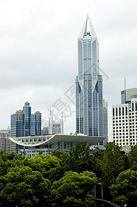上海     现代建筑的概观中心住宅树木摩天大楼正方形酒店城市背景图片