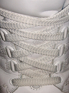 鞋带跑鞋螺纹舌头运动鞋类运动鞋花边白色培训师背景图片