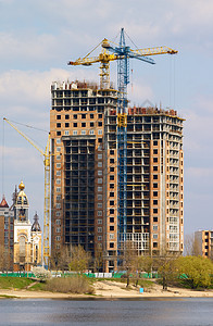 起重车和大楼商业电梯城市活动住宅安装工作采摘都市框架图片