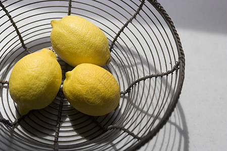 柠檬篮子设计食物高架水平水果生活房间台面家具果盘背景图片
