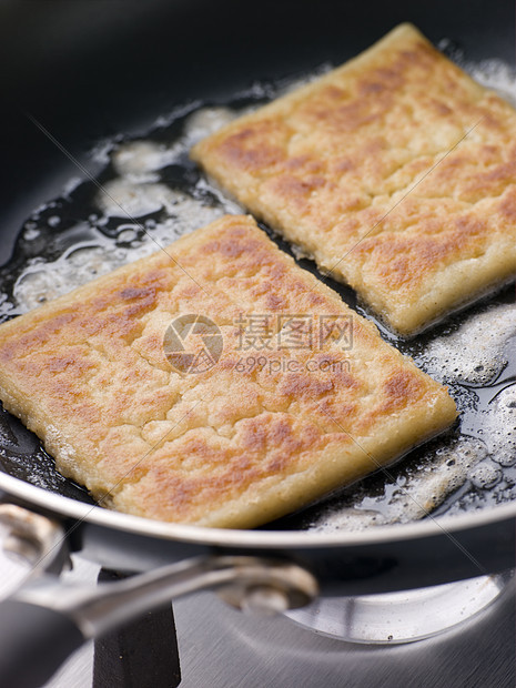 黄油炸土薯条土豆马铃薯油炸烹饪黄油面包奶制品食物农场食谱图片