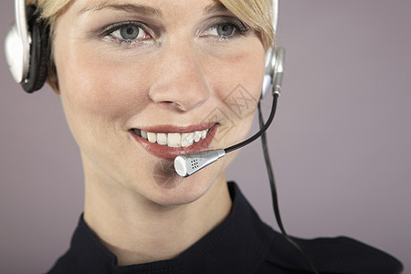 商业女商务人士佩戴电话耳机沟通通讯客户帮助商界人士女性服务呼唤设备图片
