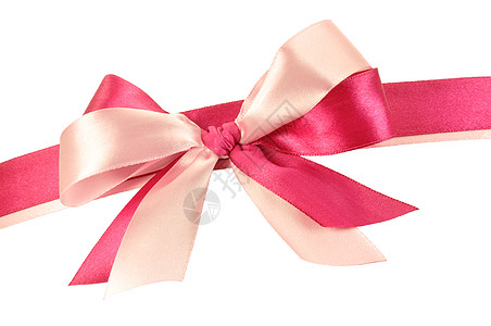 由粉红丝带制成的弓装饰品粉色礼品颜色包装领带白色背景图片