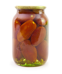 白底隔绝的玻璃罐中的西红柿图片