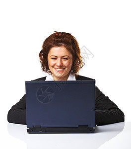 一个快乐成功的商业女人 在做大腿时笑着笑白色女性电脑女士衣领通讯黑色头发成人微笑图片