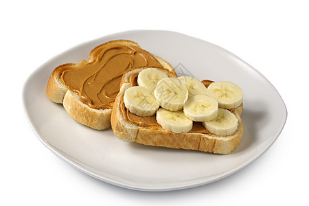 花生酱和香蕉面包面包黄油早餐传播午餐小吃盘子奶油状水果香蕉图片
