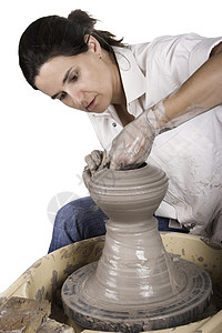 波特的艺术制品工艺艺术家黏土工作工匠白色陶器陶瓷车轮图片