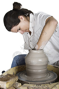 波特的艺术制品专注陶瓷陶器黏土车轮工匠工艺创造力锯末图片