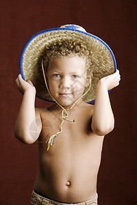 小男孩在警长Hat皮肤星星青年膀子帽子儿童儿子牛仔黑色男生背景图片